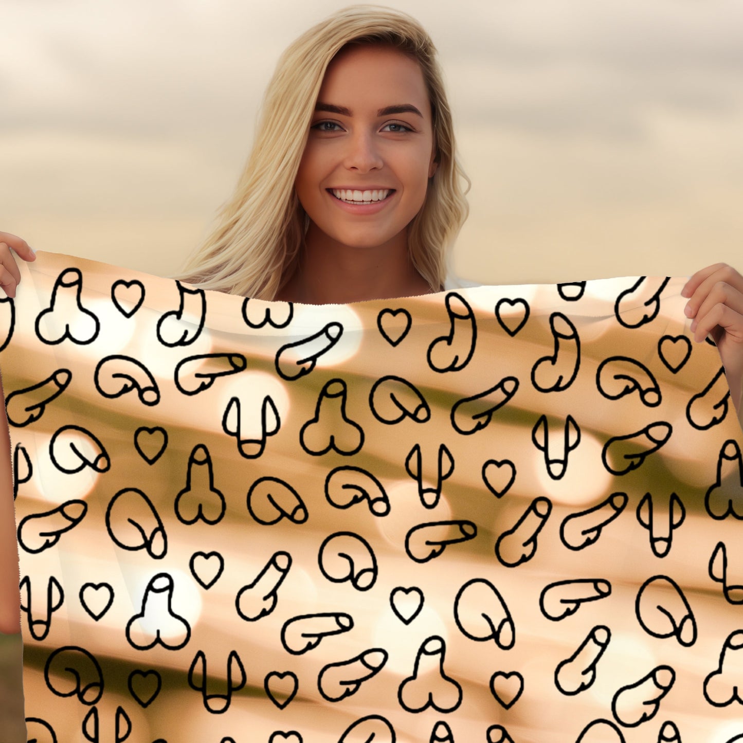 Woman holding a blanket with a penis pattern and 'Hush Humor' branding.