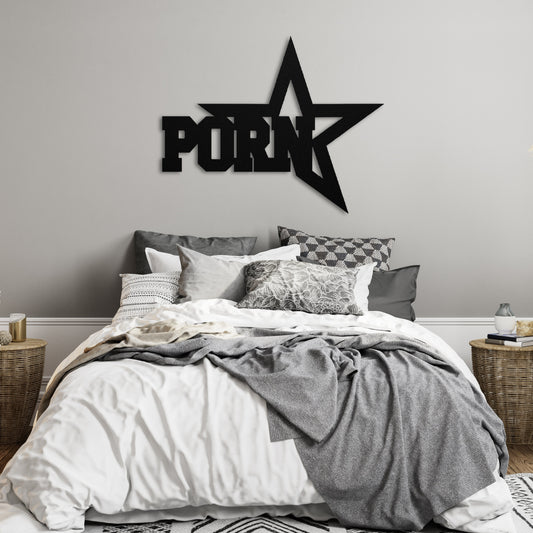 Star-shaped 'PoRN' wall decor in a bedroom setting.